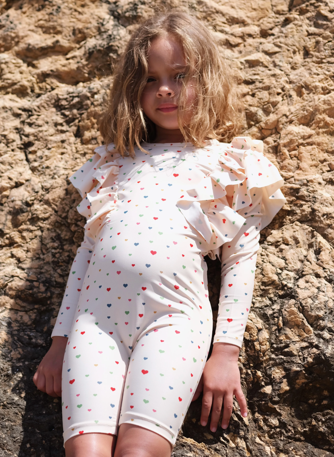 MANUCA FRILL ONESIE - MULTI HEARTS (5-6Y Only)