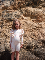 MANUCA FRILL ONESIE - MULTI HEARTS