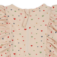 MANUCA FRILL ONESIE - MULTI HEARTS
